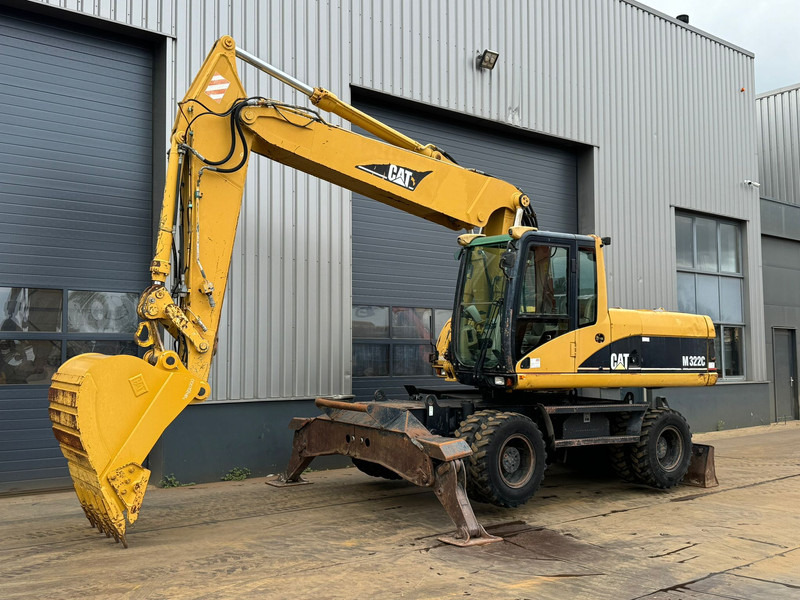 Caterpillar M322C - Hydraulic stabilizers / VA Triple boom / CE-certified, - Pelle sur pneus: photos 2 Caterpillar M322C - Hydraulic stabilizers / VA Triple boom / CE-certified, - Pelle sur pneus: photos 2