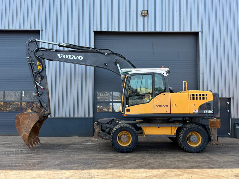Volvo EW180C - Pelle sur pneus: photos 1 Volvo EW180C - Pelle sur pneus: photos 1