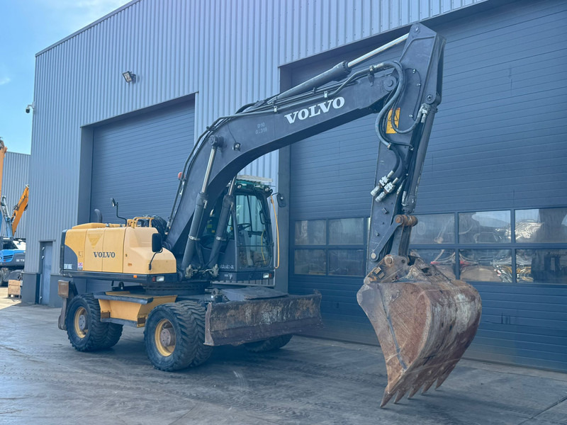 Volvo EW180C - Pelle sur pneus: photos 5 Volvo EW180C - Pelle sur pneus: photos 5