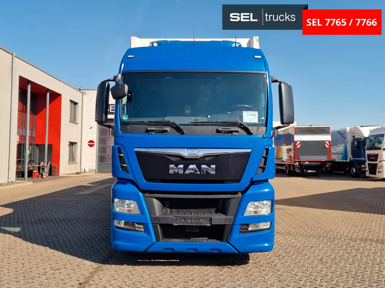 MAN TGX 18.440 4X2 LL-U/ Intarder /Hubdach/Durchlade - Camion à rideaux coulissants: photos 2 MAN TGX 18.440 4X2 LL-U/ Intarder /Hubdach/Durchlade - Camion à rideaux coulissants: photos 2