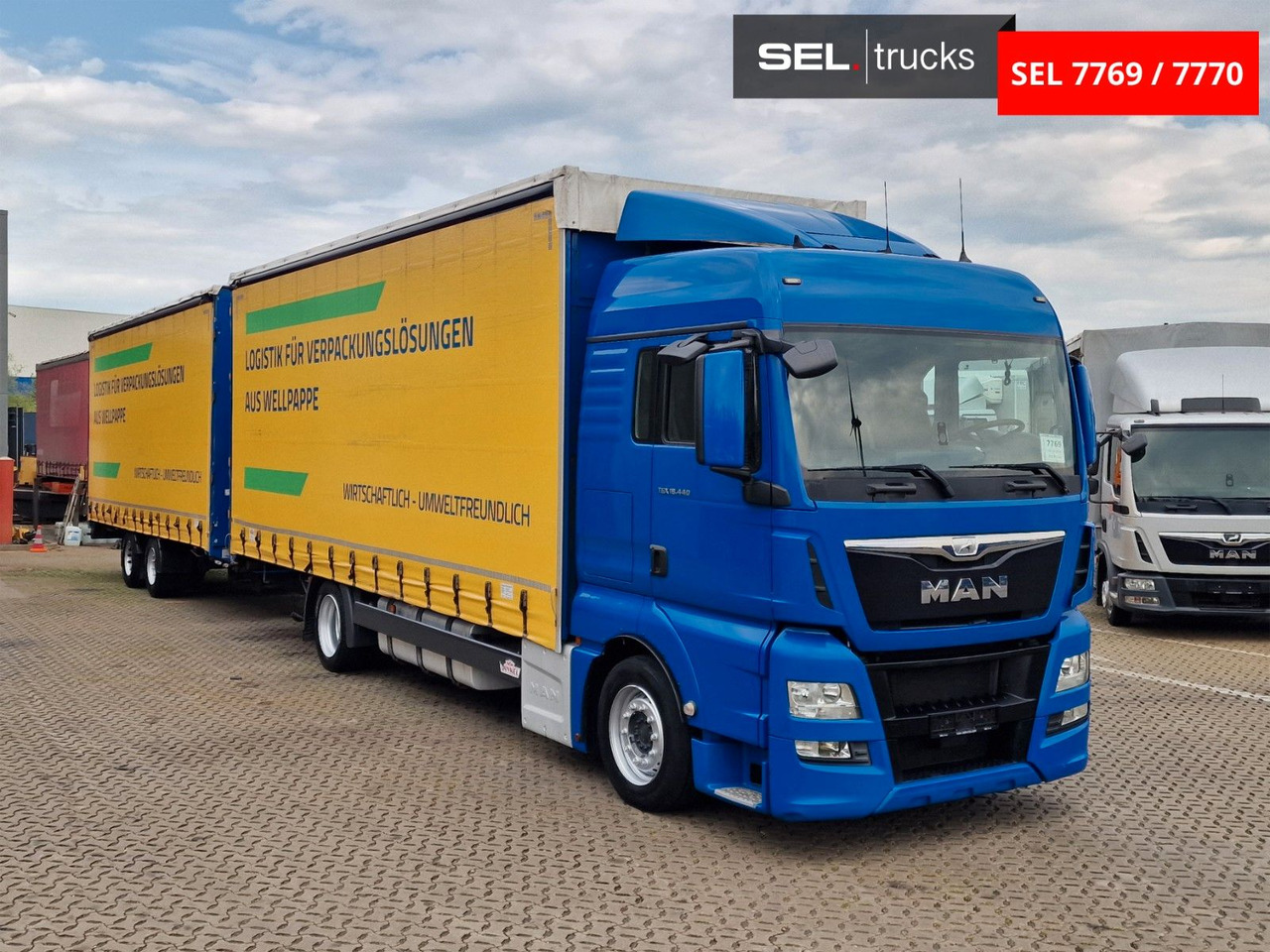 MAN TGX 18.440 4X2 LL-U/ Intarder/ Hubdach/Durchlade - Camion à rideaux coulissants: photos 3 MAN TGX 18.440 4X2 LL-U/ Intarder/ Hubdach/Durchlade - Camion à rideaux coulissants: photos 3