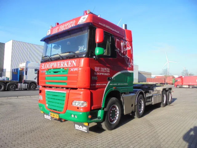 DAF XF 105 410 FAD 8X4 STEEL SUSPENSION - Camion ampliroll: photos 1 DAF XF 105 410 FAD 8X4 STEEL SUSPENSION - Camion ampliroll: photos 1