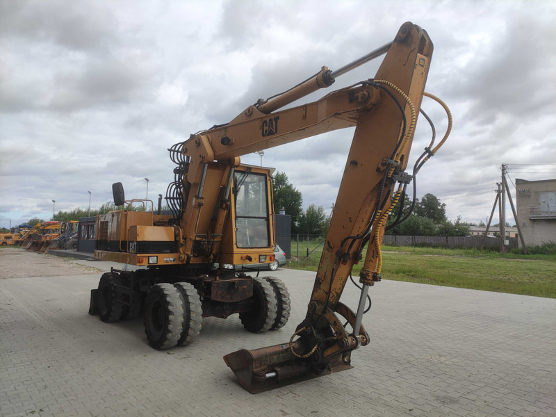 Caterpillar 214 B wheel excavator - Pelle sur pneus: photos 3 Caterpillar 214 B wheel excavator - Pelle sur pneus: photos 3