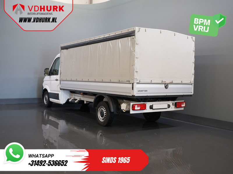 Volkswagen Crafter 35 2.0 TDI 180 pk DSG Aut. BPM VRIJ! 430x203 Open laadbak/ Schuifzeil/ Huif/ Climate/ Adapt. Cruise/ Camera/ Carplay - Utilitaire plateau: photos 2 Volkswagen Crafter 35 2.0 TDI 180 pk DSG Aut. BPM VRIJ! 430x203 Open laadbak/ Schuifzeil/ Huif/ Climate/ Adapt. Cruise/ Camera/ Carplay - Utilitaire plateau: photos 2