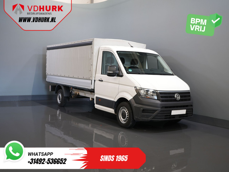 Volkswagen Crafter 35 2.0 TDI 180 pk DSG Aut. BPM VRIJ! 430x203 Open laadbak/ Schuifzeil/ Huif/ Climate/ Adapt. Cruise/ Camera/ Carplay - Utilitaire plateau: photos 1 Volkswagen Crafter 35 2.0 TDI 180 pk DSG Aut. BPM VRIJ! 430x203 Open laadbak/ Schuifzeil/ Huif/ Climate/ Adapt. Cruise/ Camera/ Carplay - Utilitaire plateau: photos 1