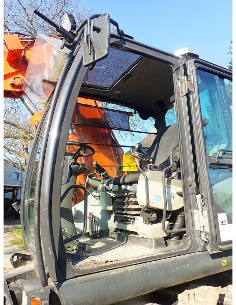 Pelle sur pneus Hitachi Zaxis 140W-5B: photos 9
