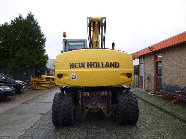NEW HOLLAND MH PLUS - Pelle sur pneus: photos 4 NEW HOLLAND MH PLUS - Pelle sur pneus: photos 4