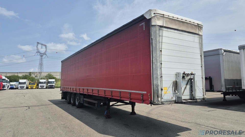 SCHMITZ CARGOBULL SCS 24/L - 13.62 EB - Semi-remorque rideaux coulissants: photos 1 SCHMITZ CARGOBULL SCS 24/L - 13.62 EB - Semi-remorque rideaux coulissants: photos 1