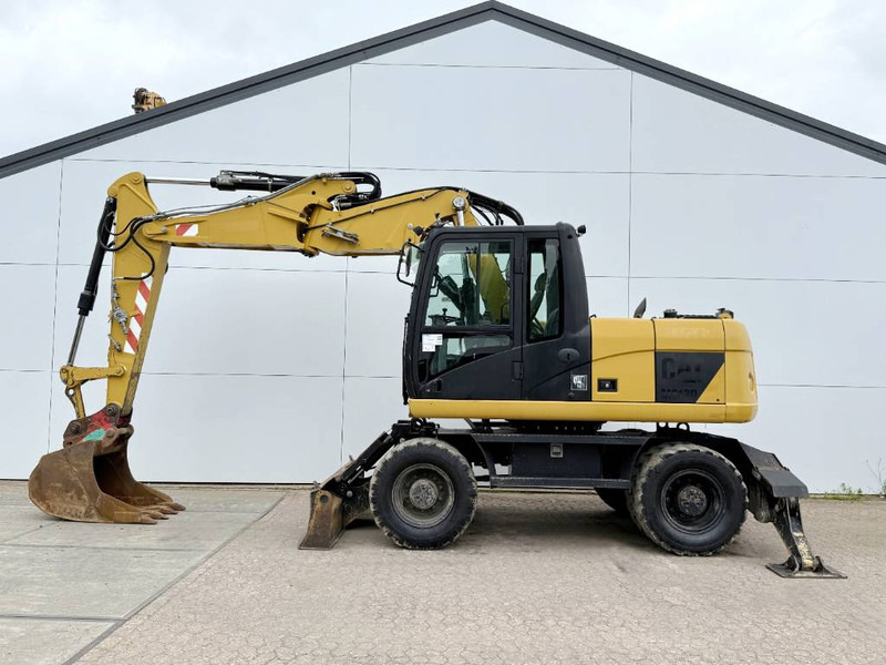 Cat M313D - Triple Boom / Quick Coupler / Camera - Pelle sur pneus: photos 1 Cat M313D - Triple Boom / Quick Coupler / Camera - Pelle sur pneus: photos 1