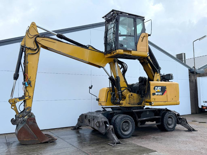 Cat MH3022 HCR - German Machine / Triple Boom - Pelle de manutention: photos 1 Cat MH3022 HCR - German Machine / Triple Boom - Pelle de manutention: photos 1