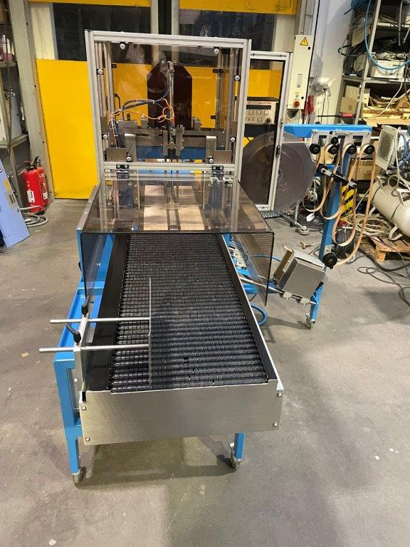 ATS Tanner UltraSonic US 2000-AB transit banding machine with pneumatic product hold-down and infeed roller table - Machine d'emballage et de conditionnement: photos 4 ATS Tanner UltraSonic US 2000-AB transit banding machine with pneumatic product hold-down and infeed roller table - Machine d'emballage et de conditionnement: photos 4