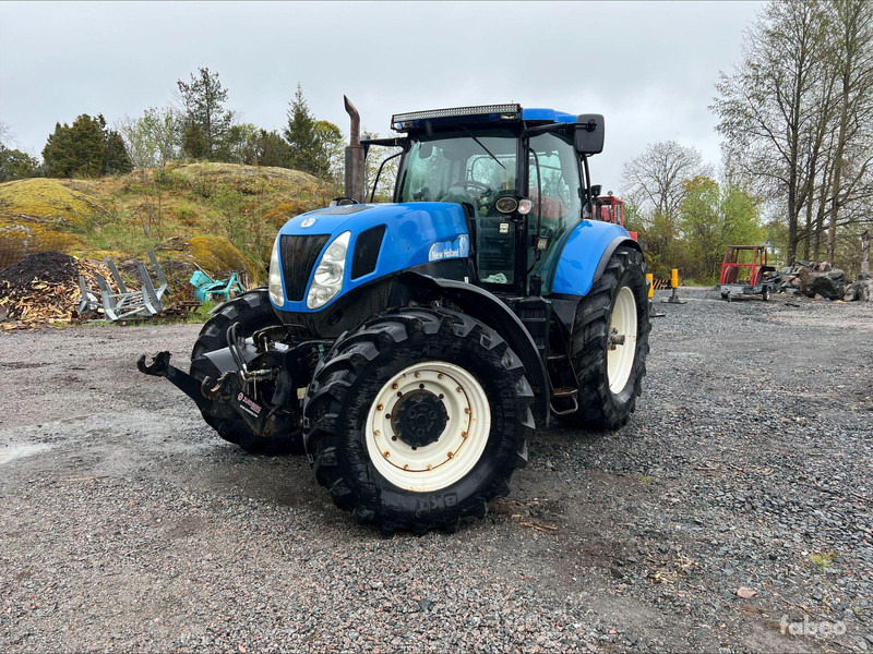 New Holland T7040 - Tracteur agricole: photos 1 New Holland T7040 - Tracteur agricole: photos 1