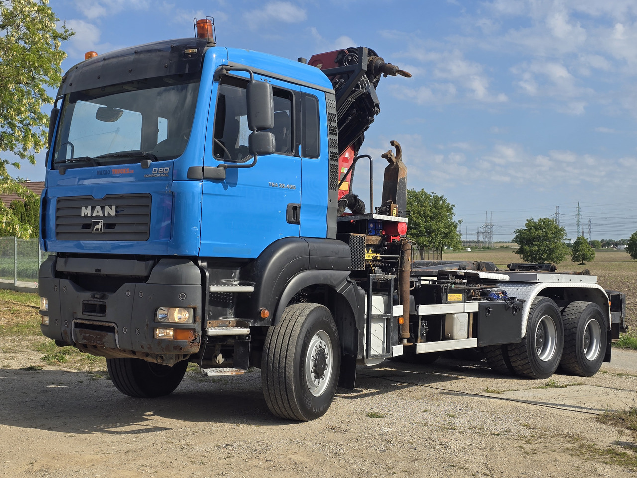 MAN TGA 33.430 6X6 / HMF 1823 K3+REM.CON./ HOOK SYSTEM - Camion ampliroll, Camion grue: photos 1 MAN TGA 33.430 6X6 / HMF 1823 K3+REM.CON./ HOOK SYSTEM - Camion ampliroll, Camion grue: photos 1