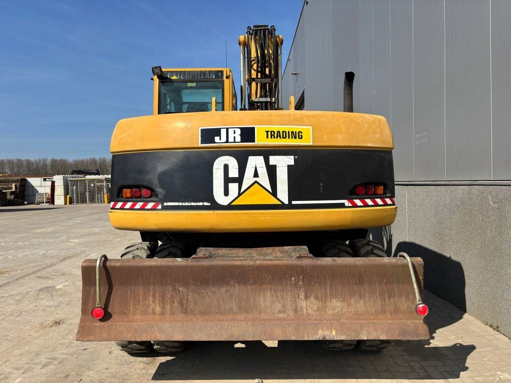 CAT M 313 C (Low verified hours)  - Pelle sur pneus: photos 4 CAT M 313 C (Low verified hours)  - Pelle sur pneus: photos 4