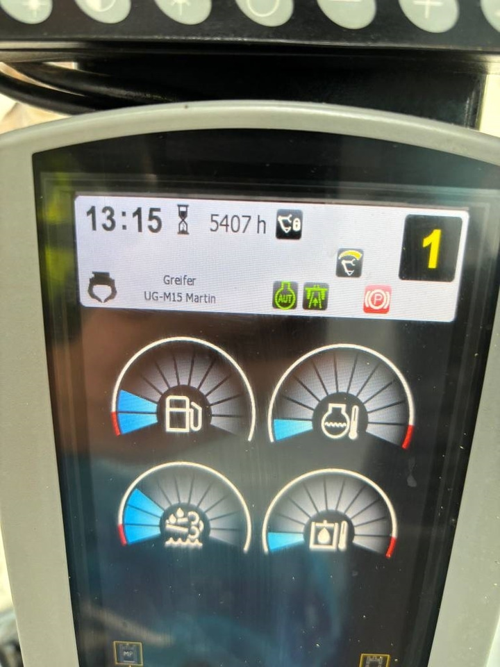 Pelle sur pneus CAT M 320 F: photos 9 Pelle sur pneus CAT M 320 F: photos 9