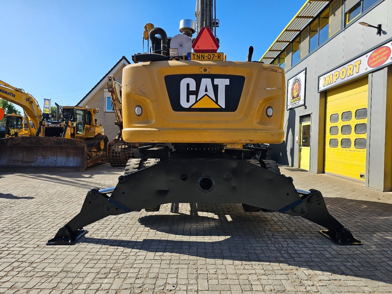 Caterpillar MH 3022 - Pelle sur pneus: photos 4 Caterpillar MH 3022 - Pelle sur pneus: photos 4