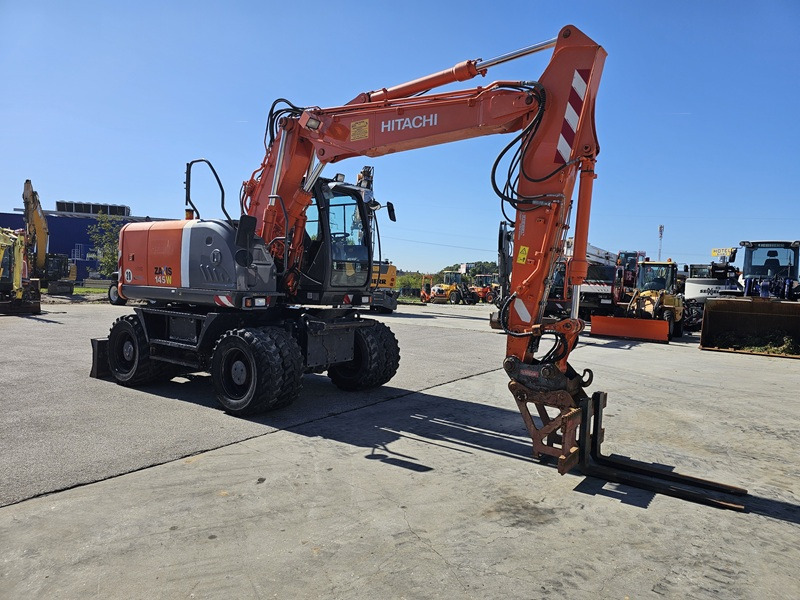 HITACHI ZX145W-3 - Pelle sur pneus: photos 5 HITACHI ZX145W-3 - Pelle sur pneus: photos 5