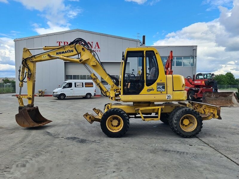 Komatsu PW110 - Pelle sur pneus: photos 1 Komatsu PW110 - Pelle sur pneus: photos 1