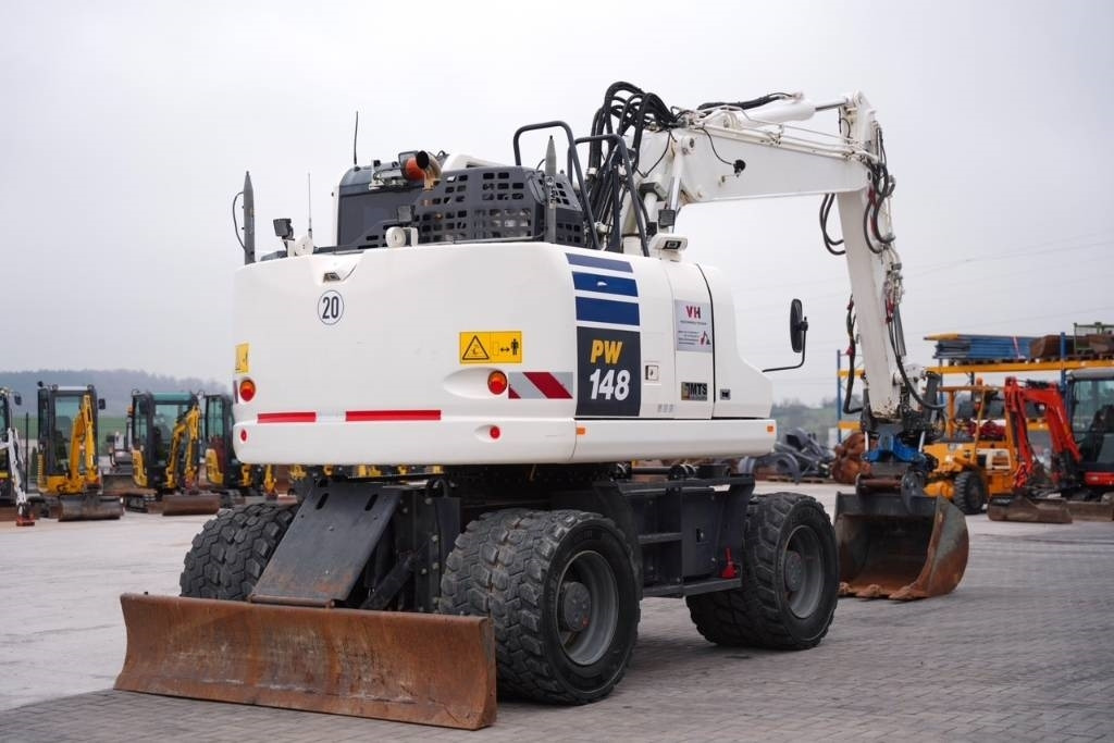 Komatsu PW 148-11 - Pelle sur pneus: photos 4 Komatsu PW 148-11 - Pelle sur pneus: photos 4