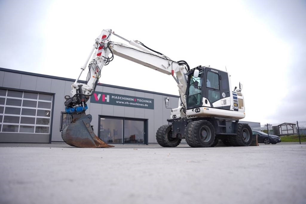 Komatsu PW 148-11 - Pelle sur pneus: photos 2 Komatsu PW 148-11 - Pelle sur pneus: photos 2