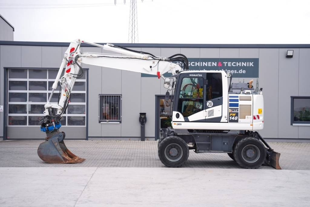 Komatsu PW 148-11 - Pelle sur pneus: photos 1 Komatsu PW 148-11 - Pelle sur pneus: photos 1