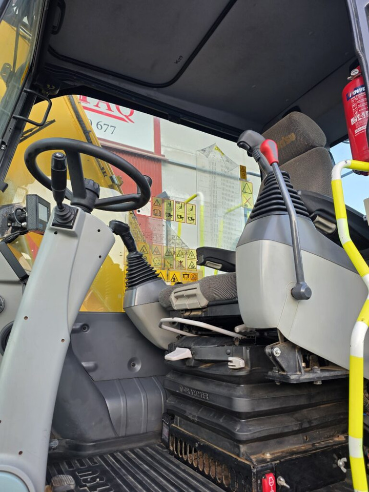 Pelle sur pneus KOMATSU PW148-11: photos 8