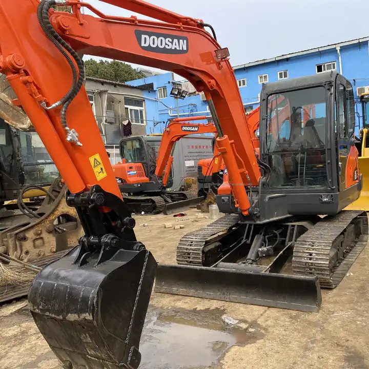 Used excavator Doosan DX60 with excellent working condition on sale Used Doosan DX60 excavator, Doosan DX60 mini excavators - Pelle sur chenille: photos 1 Used excavator Doosan DX60 with excellent working condition on sale Used Doosan DX60 excavator, Doosan DX60 mini excavators - Pelle sur chenille: photos 1
