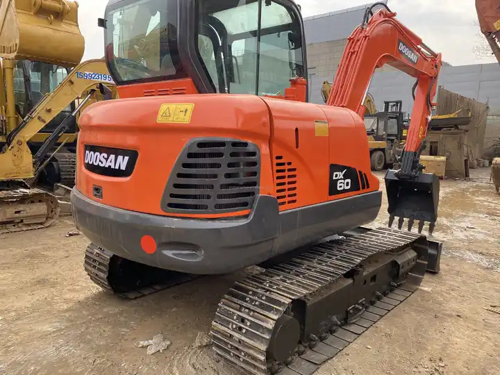 Used excavator Doosan DX60 with excellent working condition on sale Used Doosan DX60 excavator, Doosan DX60 mini excavators - Pelle sur chenille: photos 4 Used excavator Doosan DX60 with excellent working condition on sale Used Doosan DX60 excavator, Doosan DX60 mini excavators - Pelle sur chenille: photos 4
