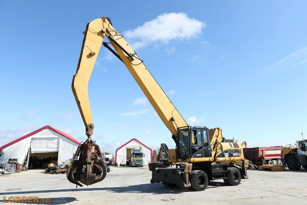 CAT M 325 D MH - Pelle de manutention: photos 1 CAT M 325 D MH - Pelle de manutention: photos 1