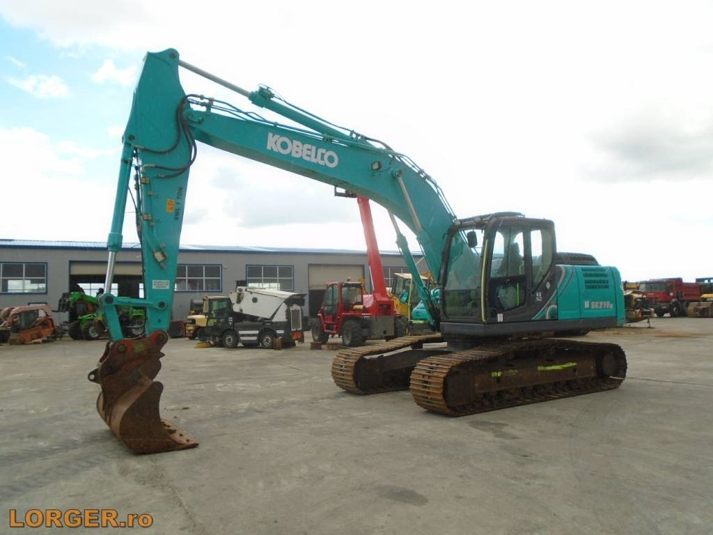 Kobelco SK 210 LC-10 - Pelle sur chenille: photos 1 Kobelco SK 210 LC-10 - Pelle sur chenille: photos 1