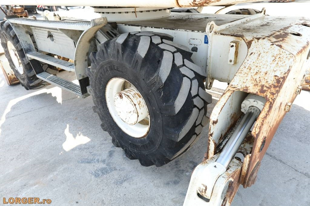 Pelle sur pneus Liebherr A 914: photos 17