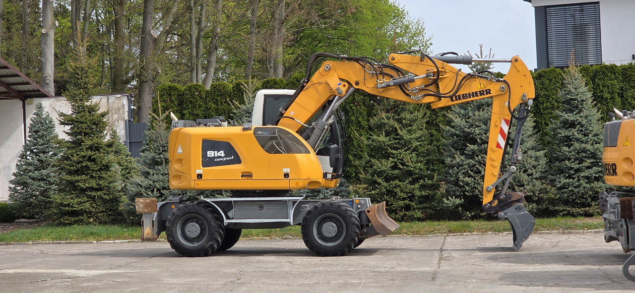 Liebherr A 914 COMPACT - Pelle sur pneus: photos 1 Liebherr A 914 COMPACT - Pelle sur pneus: photos 1