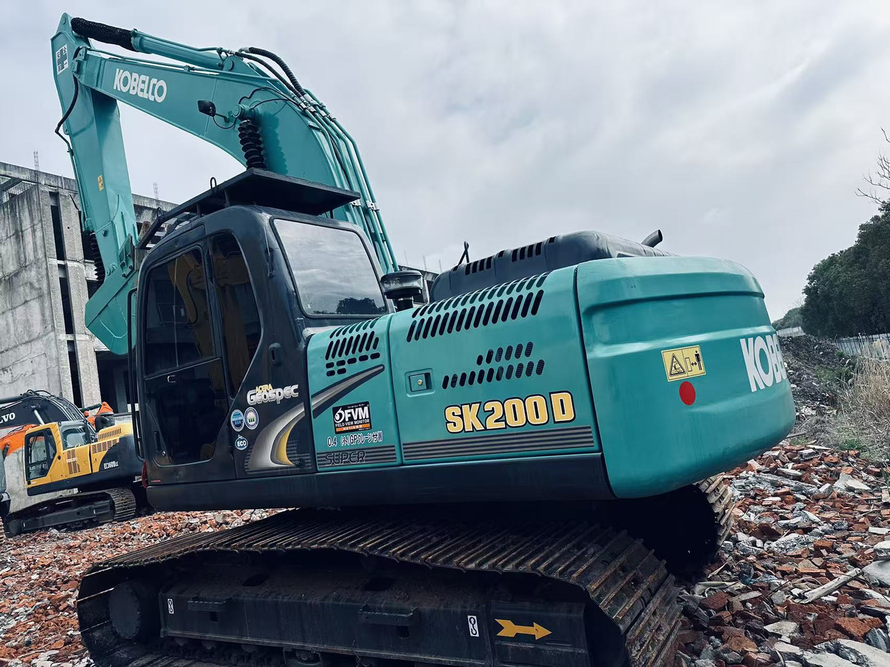 Kobelco SK200D - Pelle sur chenille: photos 1 Kobelco SK200D - Pelle sur chenille: photos 1