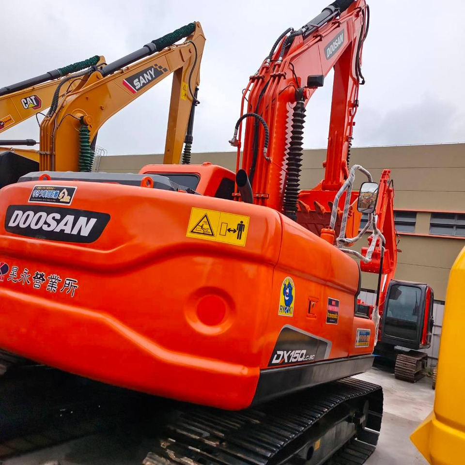 Doosan DX 150 LC - Pelle sur chenille: photos 1 Doosan DX 150 LC - Pelle sur chenille: photos 1