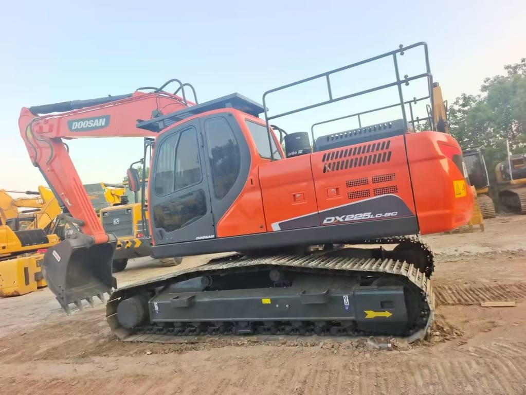 Doosan DX 225 LC-9C - Pelle sur chenille: photos 1 Doosan DX 225 LC-9C - Pelle sur chenille: photos 1