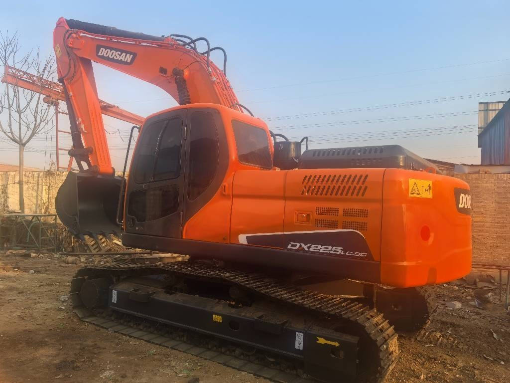 Doosan DX 225 LC-9c - Pelle sur chenille: photos 1 Doosan DX 225 LC-9c - Pelle sur chenille: photos 1