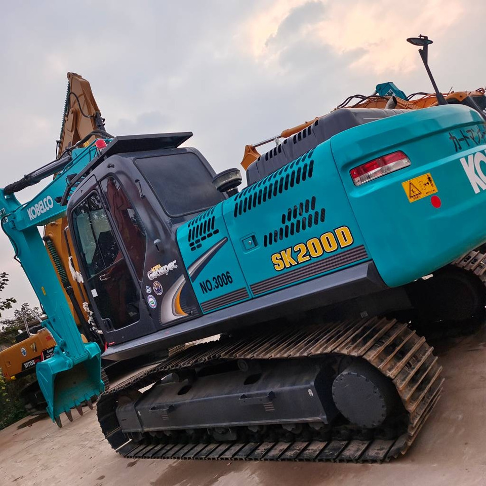 Kobelco SK 200 - Pelle sur chenille: photos 1 Kobelco SK 200 - Pelle sur chenille: photos 1