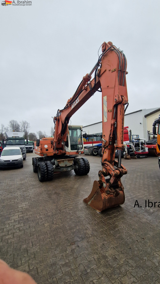 Pelle sur pneus Atlas 1604K Verstellausleger: photos 12