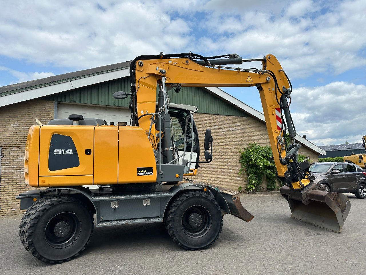 Liebherr A914 - Pelle sur pneus: photos 4 Liebherr A914 - Pelle sur pneus: photos 4