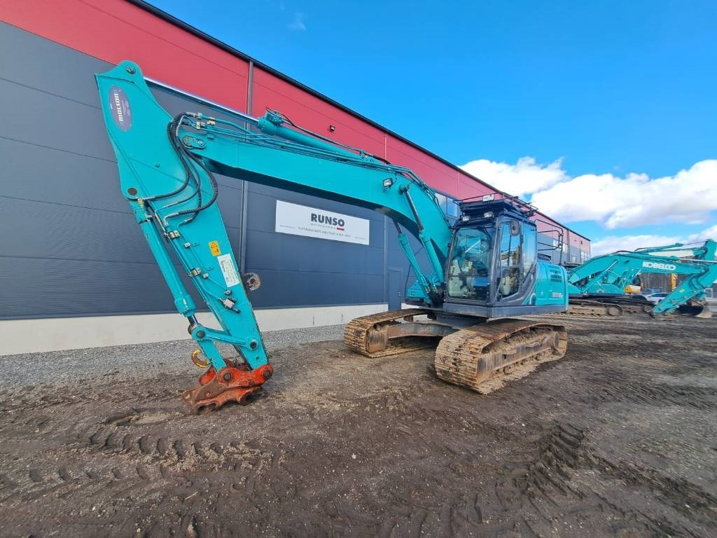Kobelco SK 210-10 - Pelle sur chenille: photos 1 Kobelco SK 210-10 - Pelle sur chenille: photos 1