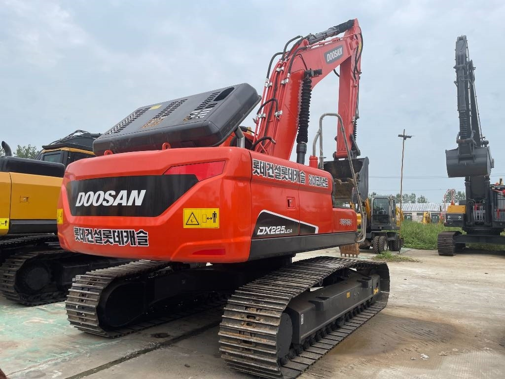 Doosan DX225LCA - Pelle sur chenille: photos 3 Doosan DX225LCA - Pelle sur chenille: photos 3
