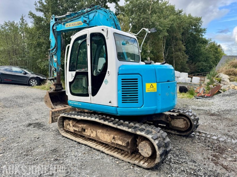 2008 New Holland E70SR-ES Gravemaskin - Tannskuffe - Grøfteskuffe - Pusseskuffe - Timer: 5746 - Mini pelle: photos 3 2008 New Holland E70SR-ES Gravemaskin - Tannskuffe - Grøfteskuffe - Pusseskuffe - Timer: 5746 - Mini pelle: photos 3