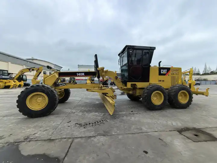 Original Caterpillar brand motor grader 140K CAT road construction grader USA made 140K for sale - Niveleuse: photos 4 Original Caterpillar brand motor grader 140K CAT road construction grader USA made 140K for sale - Niveleuse: photos 4