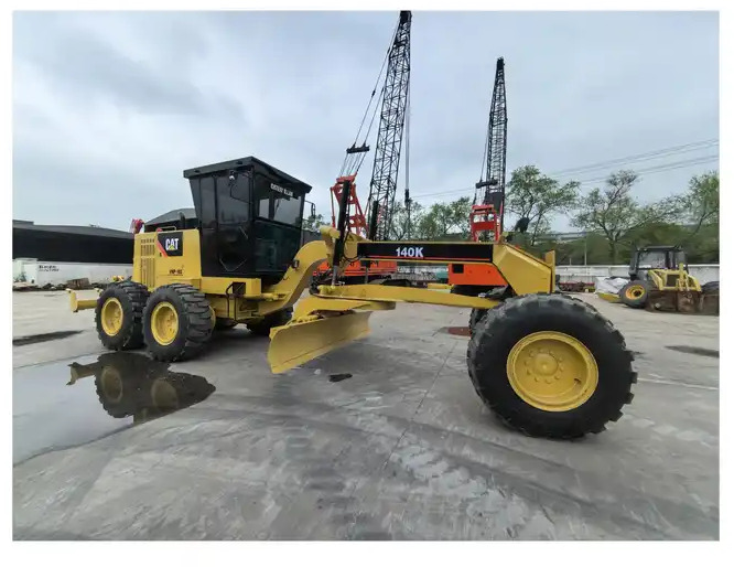 Original Caterpillar brand motor grader 140K CAT road construction grader USA made 140K for sale - Niveleuse: photos 1 Original Caterpillar brand motor grader 140K CAT road construction grader USA made 140K for sale - Niveleuse: photos 1