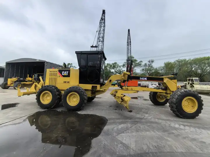 Original Caterpillar brand motor grader 140K CAT road construction grader USA made 140K for sale - Niveleuse: photos 5 Original Caterpillar brand motor grader 140K CAT road construction grader USA made 140K for sale - Niveleuse: photos 5