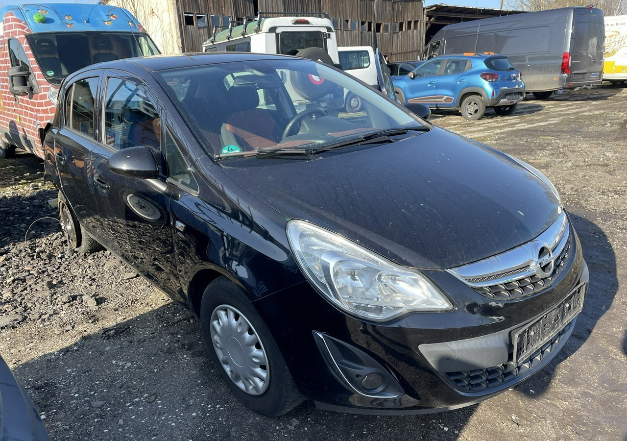 Opel Corsa D Corsa 1.4-87 KM Klima 2011 - Voiture à hayon: photos 1 Opel Corsa D Corsa 1.4-87 KM Klima 2011 - Voiture à hayon: photos 1