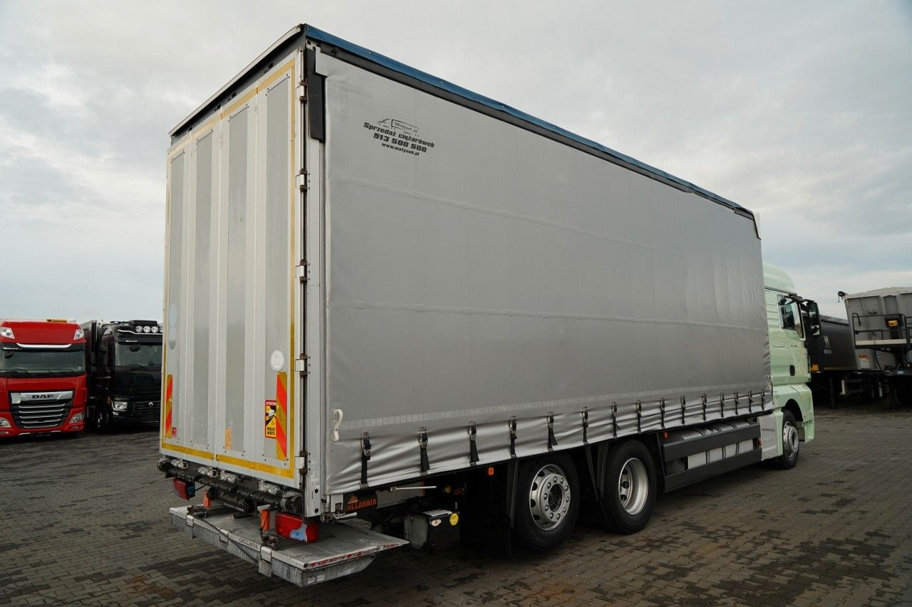 MAN TGX 26.440 / 6x2 / FIRANKA - 8,15 m / SOLÓWKA / MAN TGX 26.440 / 6x2 / FIRANKA - 8,15 m / SOLÓWKA / - Camion à rideaux coulissants: photos 4 MAN TGX 26.440 / 6x2 / FIRANKA - 8,15 m / SOLÓWKA / MAN TGX 26.440 / 6x2 / FIRANKA - 8,15 m / SOLÓWKA / - Camion à rideaux coulissants: photos 4
