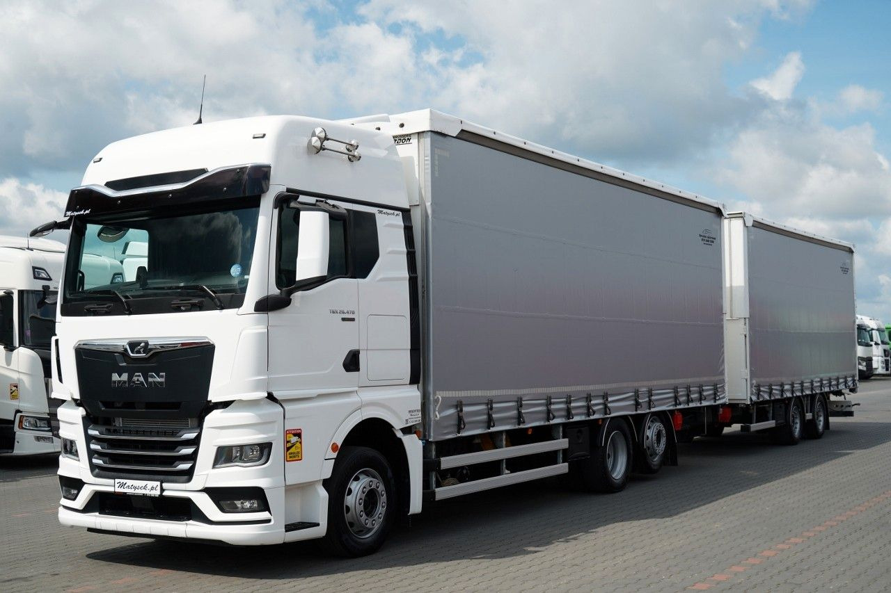 MAN TGX 26.470 / ZESTAW TANDEM 120 M3 / PRZEJAZDOWY - Camion à rideaux coulissants: photos 1 MAN TGX 26.470 / ZESTAW TANDEM 120 M3 / PRZEJAZDOWY - Camion à rideaux coulissants: photos 1
