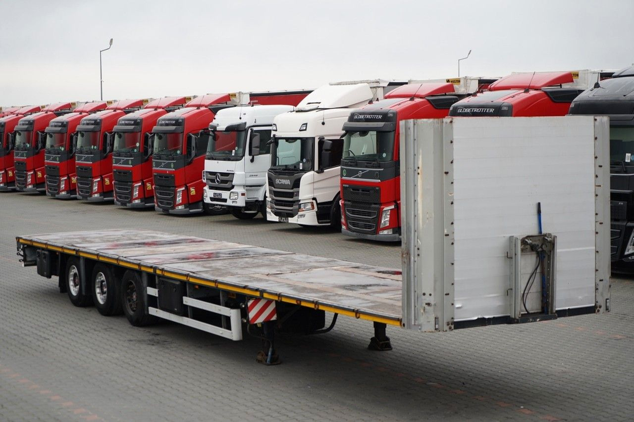 ZASŁAW PLATFORMA NISKOPODWOZIOWA + HAKI PODKONTENERY - Semi-remorque plateau: photos 1 ZASŁAW PLATFORMA NISKOPODWOZIOWA + HAKI PODKONTENERY - Semi-remorque plateau: photos 1