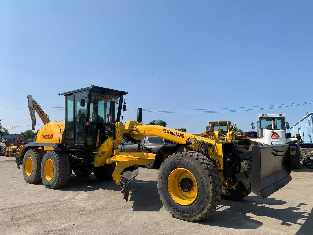 New Holland F 156.6 A - Niveleuse: photos 1 New Holland F 156.6 A - Niveleuse: photos 1
